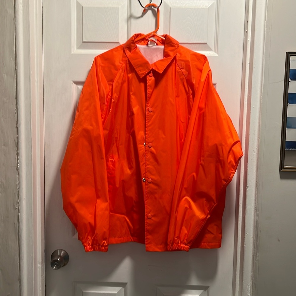 Bright orange wind breaker jacket